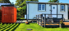 Small Cozy Shepherd hut 20 by 7 feet with boxed in high double bed